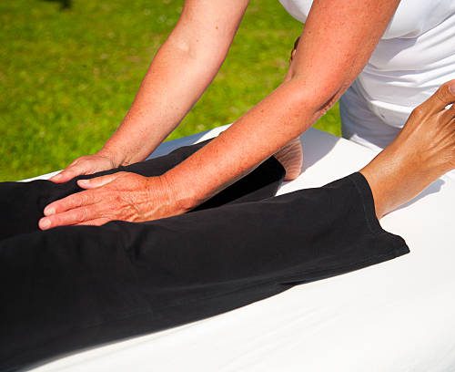 Polarity massage; a technique of gently rocking, holding and massaging to stimulate relaxation, restore energy flow and encourage revitalization