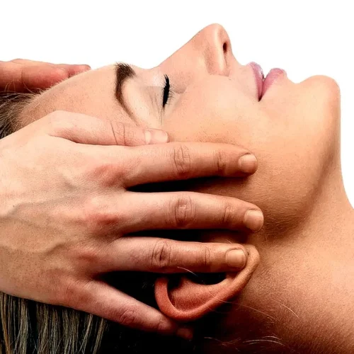 Hands massaging a person's face-Life massage and wellness (Craniosacral Therapy)