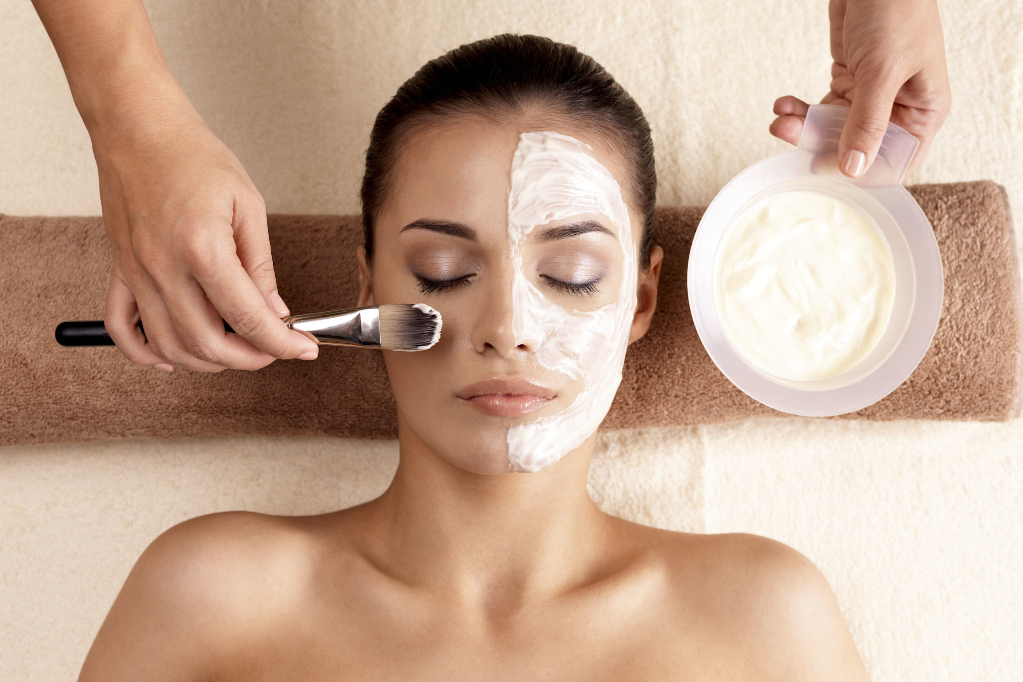 A woman receiving a facial--Life massage and wellness. (Teen Facial)