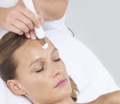 Woman receiving a facial-Life massage and wellness (signature facial)